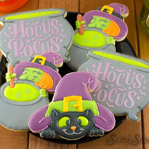 cat under witch hat cookies plate