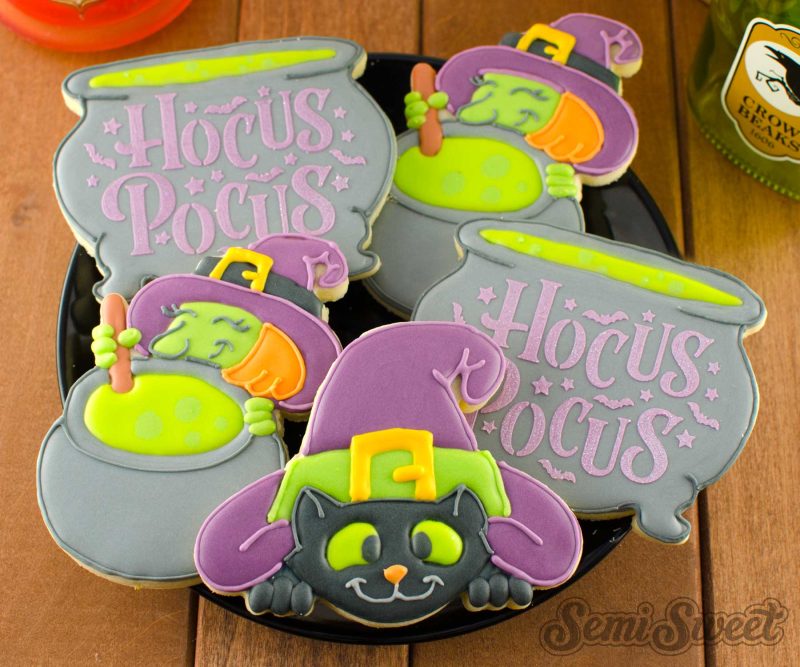 cat under witch hat cookies plate